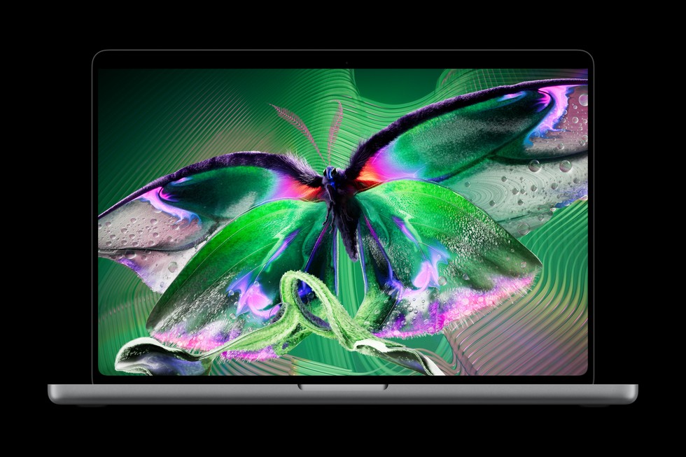 Een MacBook Pro met een kleurrijke afbeelding op het scherm